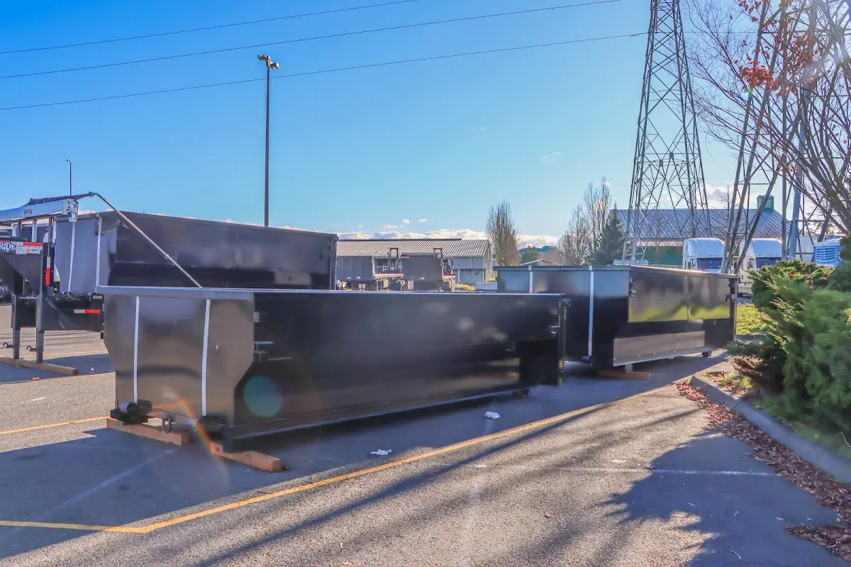 Roll-off dumpster ready for waste disposal at job site for 8 Yard Dumpster Rental in Newton